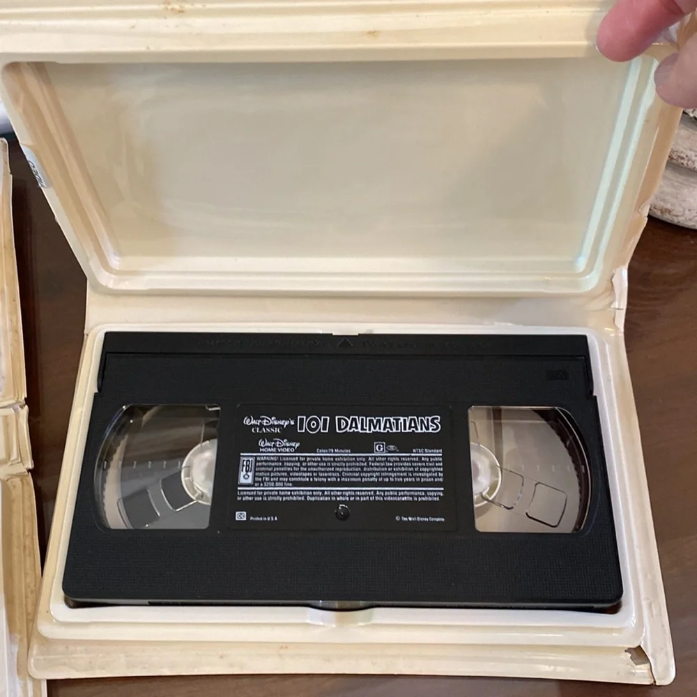 The Lion King VHS and 101 Dalmatians VHS